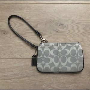 Silver/light grey Coach Wristlet